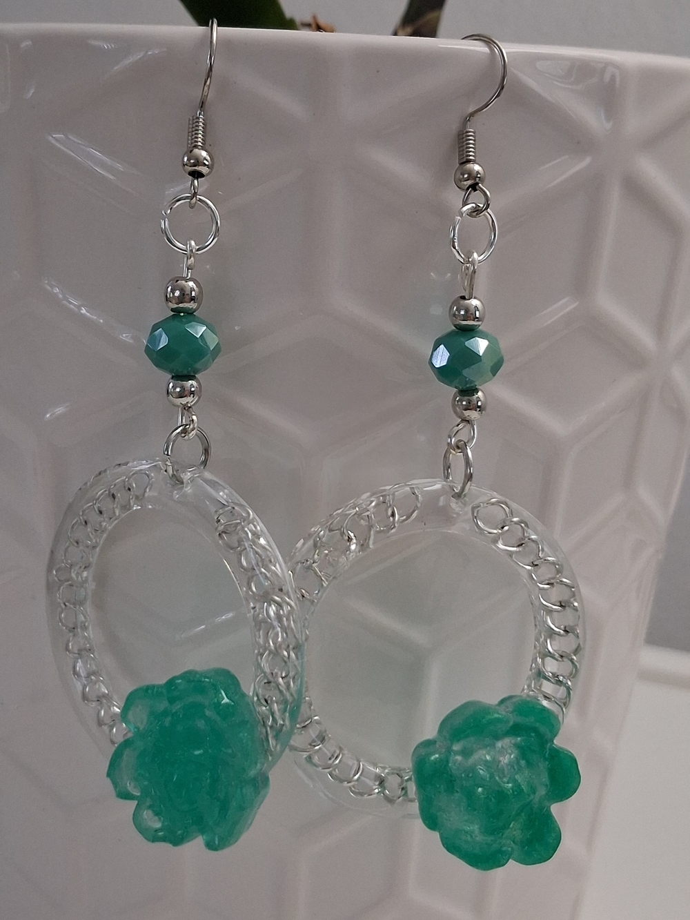 Silver Hoop Earrings with Green Flower Accent